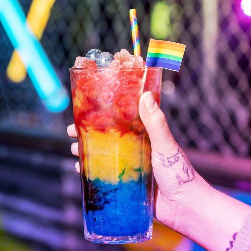 Alcoholic beverage made with layers of pride colours